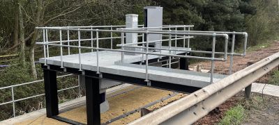 Cabinets and staging raised above flood risk on FLI screw piles