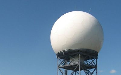Radome mounted on FLI Structures radar tower